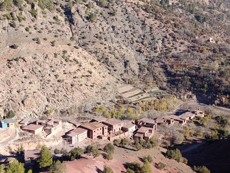 Ighor Nikhrazen, in the commune of Aït Bouali, Morocco, with houses below the mountain slopes.