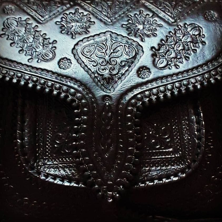 Trends pass, the black handbag remains