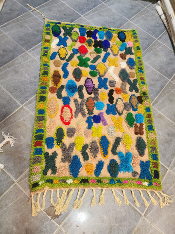 Handwoven Moroccan Boucherouite rug — workshop view
