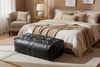 Black and white ottoman in bedroom