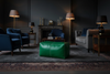 Emerald Green Ottoman in Dark Luxurious Living Room