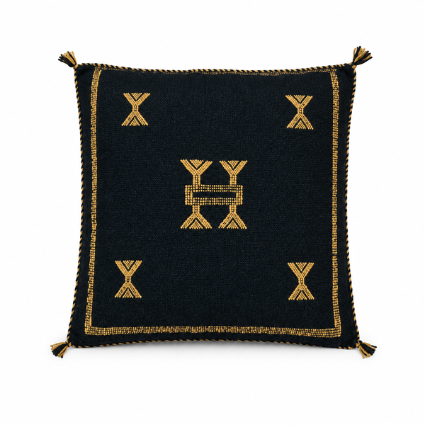 Filled Sidi Omar Black pillow with gold embroidery on a clean white background
