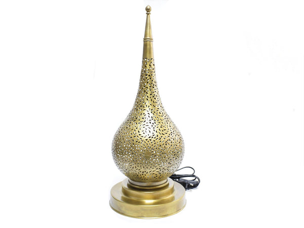 Decorative gold lamp with intricate design on a white background