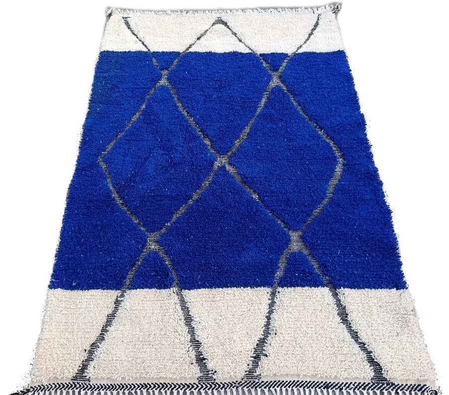 Izri — The Unbroken Line | Handwoven Moroccan Wool Rug | Ivory & Cobalt | 227 × 152 cm
