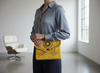 Jeblia Yellow Leather Clutch with Model