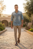 Male model wearing brown leather sandals
