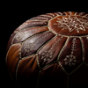 Moroccan leather ottoman tan flowers ? tooling close-up ? artisan craft Morocco | Moroccan Corridor©