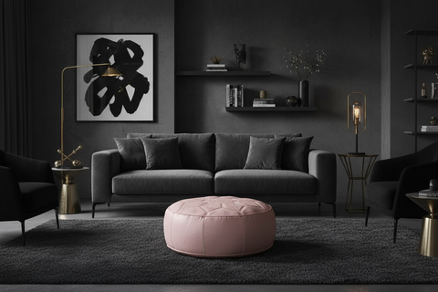 Soft pink leather ottoman in luxurious dark living room - larger diameter