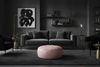 Soft pink leather ottoman in luxurious dark living room - larger diameter