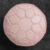 Soft pink leather ottoman - top view