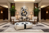 White and black ottoman in lobby